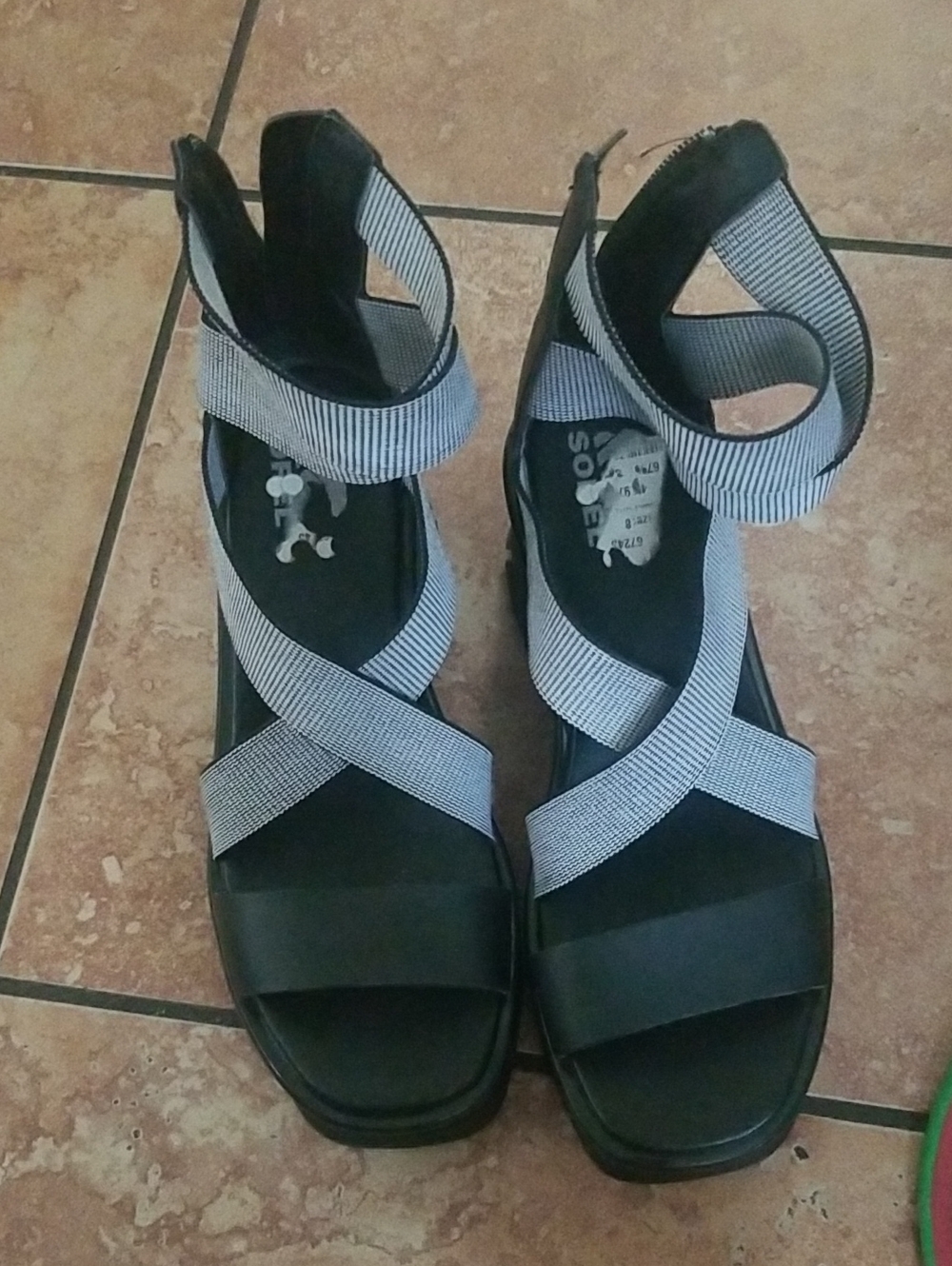 Sorel Black Sandals with White Striped Crisscross Straps